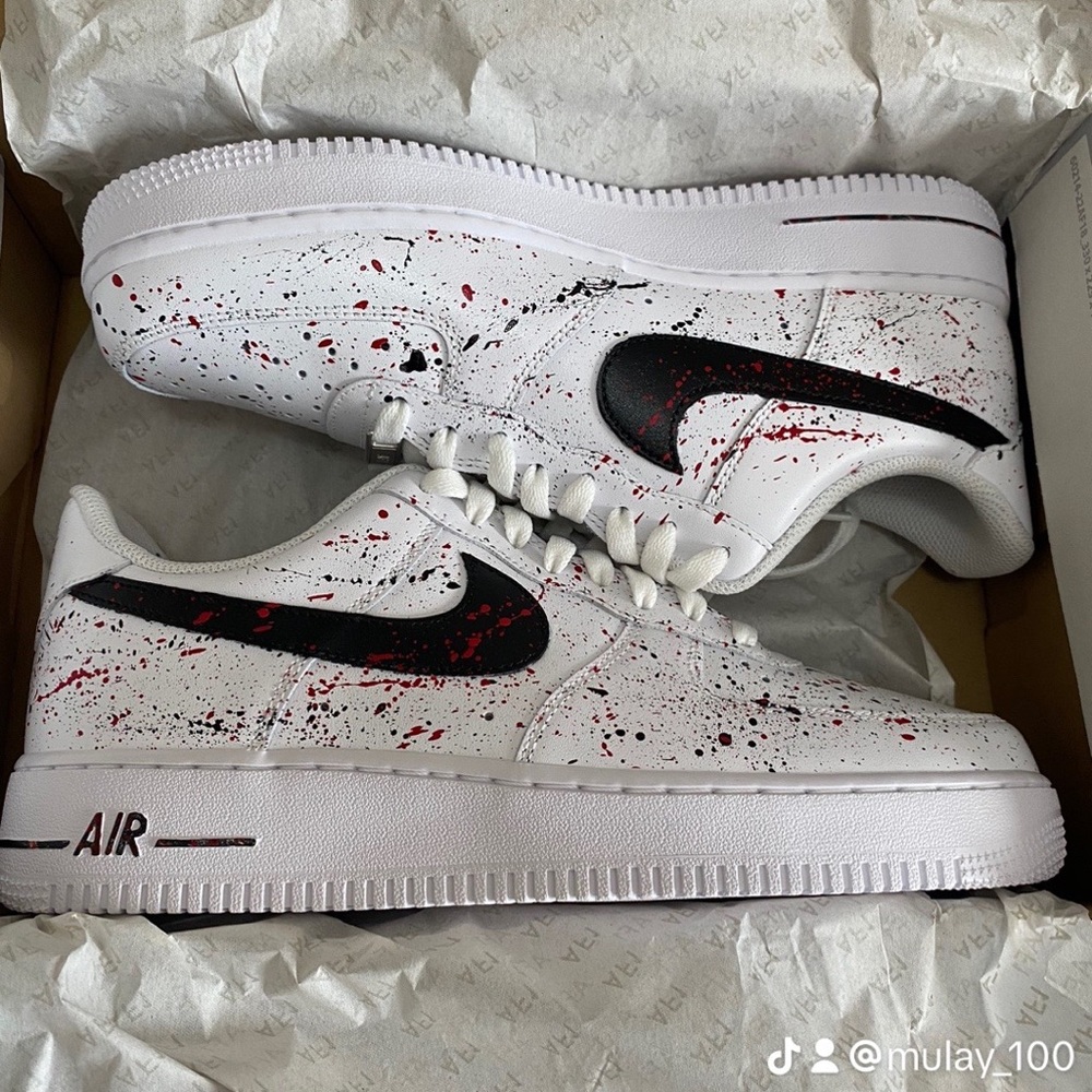 Brand new Air Force One with custom red and black splatter .